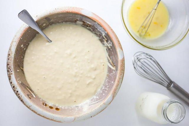 Filling pizza dough in the oven