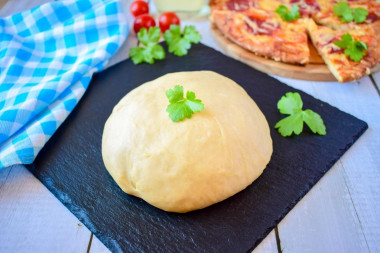 Pizza dough on kefir without yeast