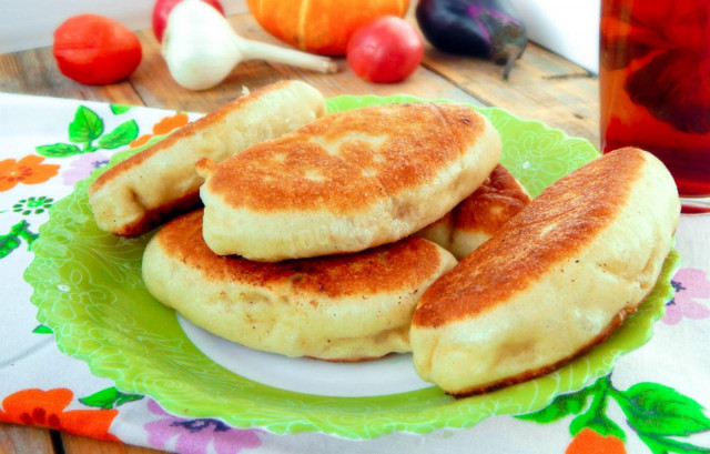 Kefir pies with yeast in a frying pan