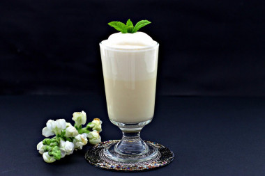 Milkshake with ice cream in a blender