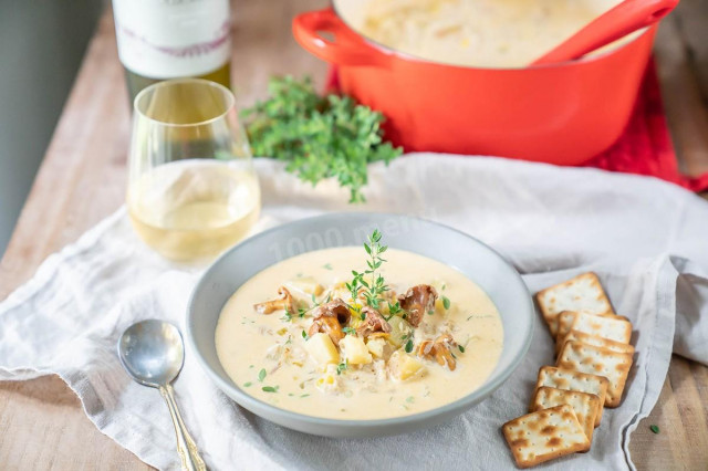 Soup with hard cheese and chanterelles