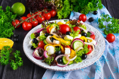 Salad with squid, cucumber, cheese and bell pepper