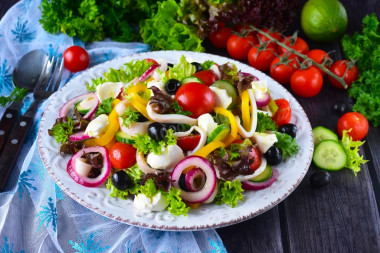 Salad with squid, cucumber, cheese and bell pepper