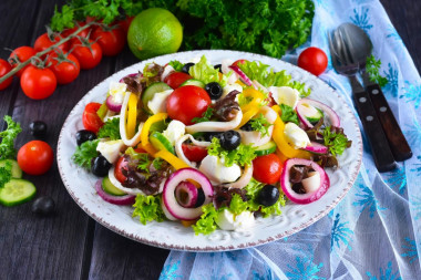 Salad with squid, cucumber, cheese and bell pepper