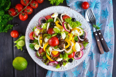 Salad with squid, cucumber, cheese and bell pepper