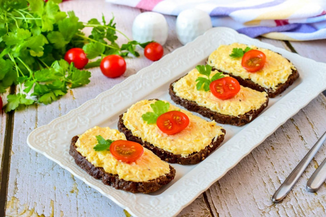 Sandwiches with black bread and cheese