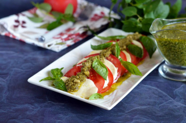 Caprese tomatoes with pesto and mozzarella