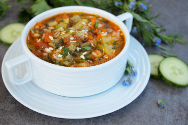 Pickle of fresh cucumbers with pearl barley