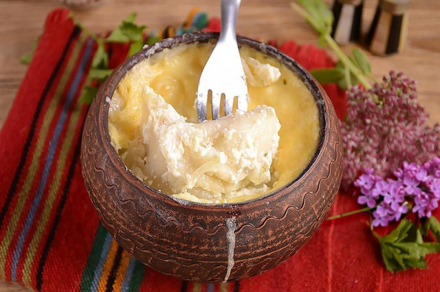 Dumplings with potatoes baked in the oven