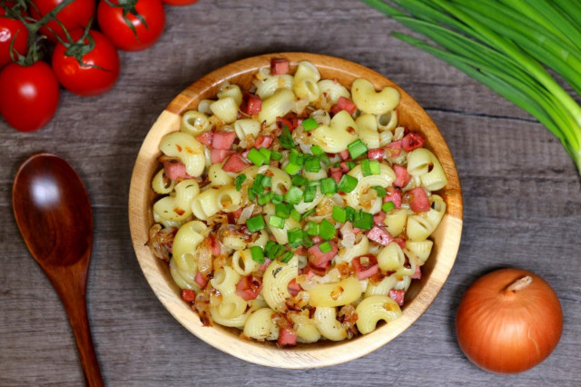 Pasta with sausage in a frying pan