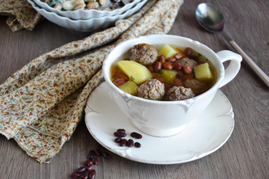 Soup with meatballs and canned beans