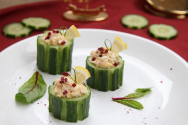 Stuffed cucumbers with egg and cod liver