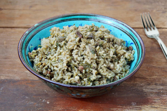 Bakhsh pilaf in a cauldron