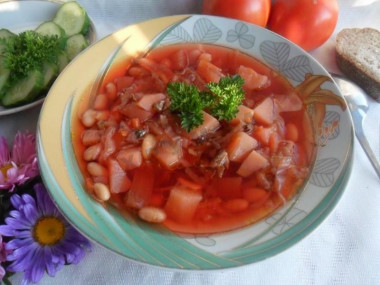 Borscht with sprat in tomato and beans