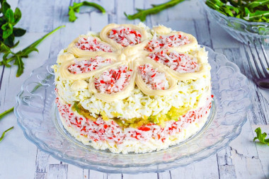 Salad with melted cheese and crab sticks