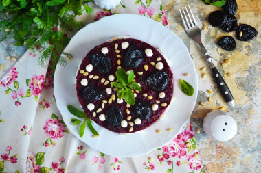 Genghis Khan salad with prunes and nuts