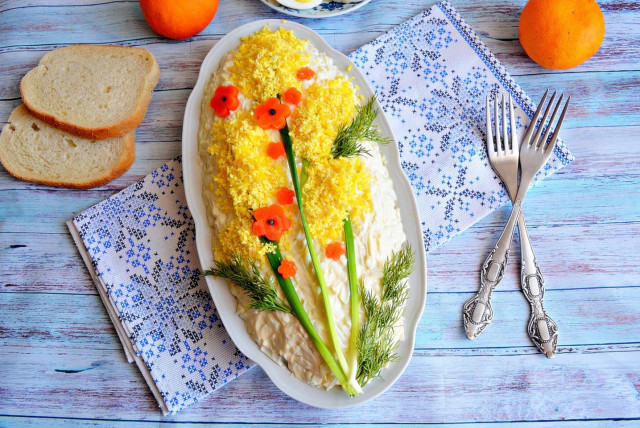 Mimosa salad with sprats