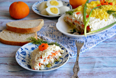 Mimosa salad with sprats