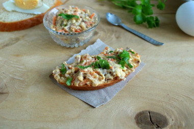 Herring caviar with carrots and melted cheese