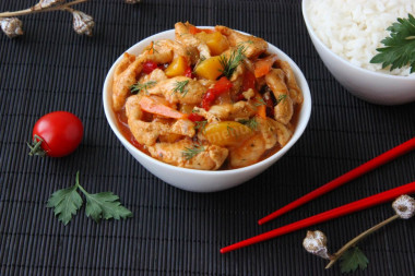 Chicken with peaches in sweet and sour sauce