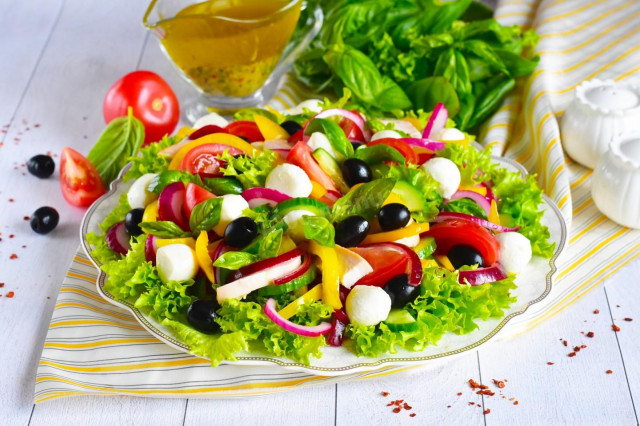 Salad with smoked breast, tomatoes, cheese and cucumbers