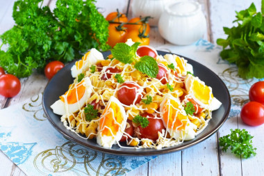 Simple salad with egg and cheese