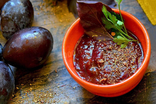 Adjika with garlic and bitter pepper from prunes for winter