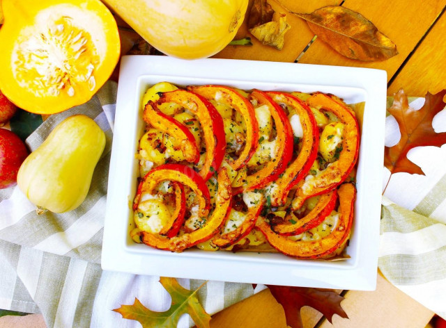 Pumpkin with honey and potatoes baked in the oven