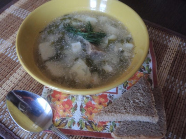 Green sorrel soup on pork with eggs