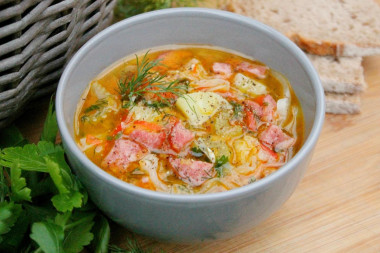 Young cabbage soup with smoked sausage