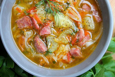 Young cabbage soup with smoked sausage