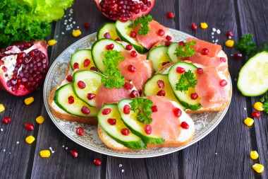 Sandwiches with red fish and cucumber