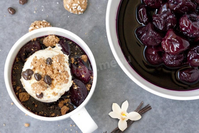 Cherry dessert in red wine with almond flavor