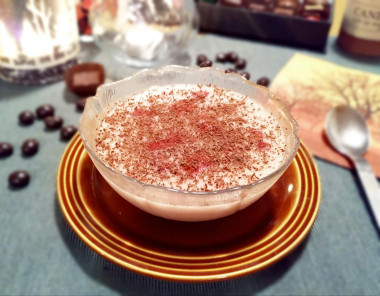 Milk jelly with banana and raspberries