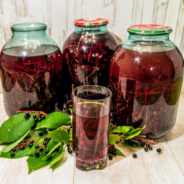 Compote of fresh berries cherry trees in jars for winter