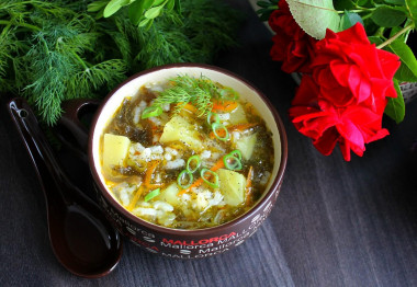 Soup with seaweed and rice.