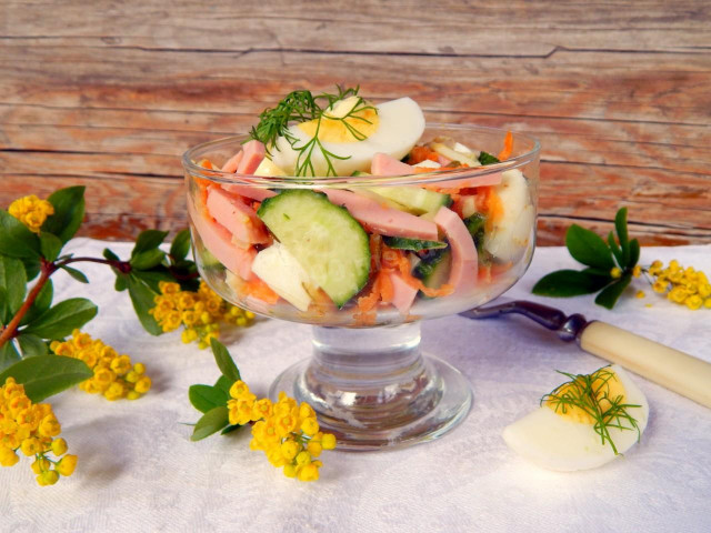 Korean carrot salad, sausage and pickled cucumbers