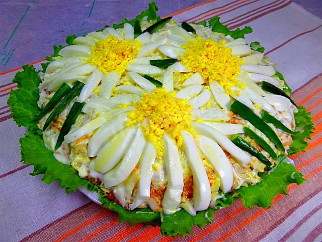 Chamomile salad from canned pink salmon with its own juice