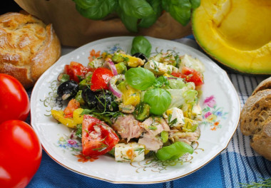 Mediterranean salad with tuna, cheese, avocado and olives