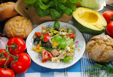 Mediterranean salad with tuna, cheese, avocado and olives