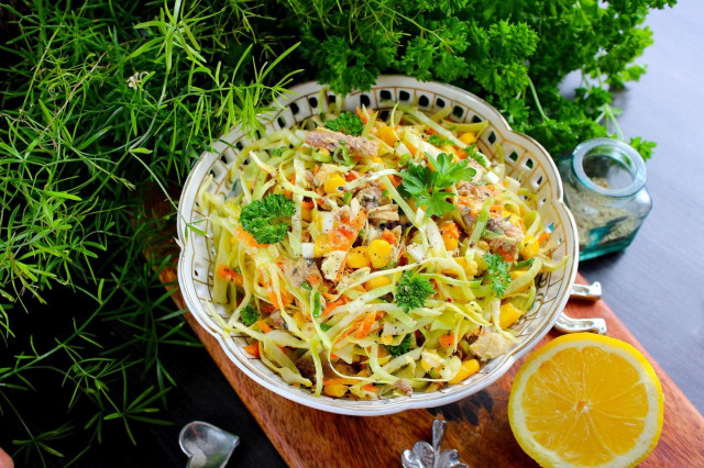 Salad with canned fish, corn and eggs