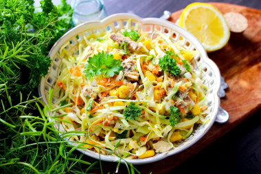 Salad with canned fish, corn and eggs