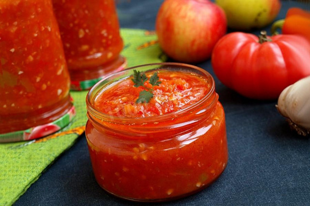 Adjika with Bulgarian and hot pepper, tomatoes and apples