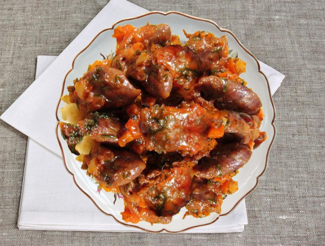 Chicken hearts with vegetables in a slow cooker