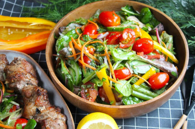 Vegetable salad with green beans and cherry tomatoes