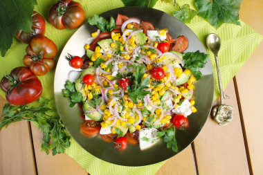 Avocado salad with corn and tomatoes