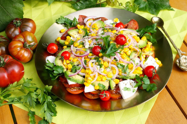 Avocado salad with corn and tomatoes