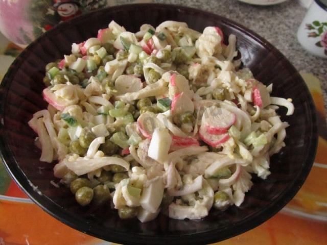 Sea salad with squid and green peas