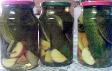 Pickled cucumbers with apples for winter