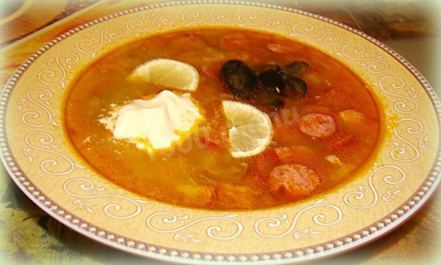 Soup combined hodgepodge with smoked meats in meat broth